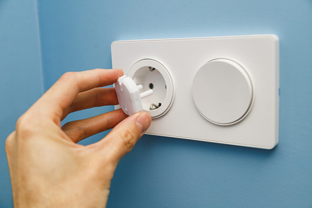 Holiday Electrical Safety Tips From Experts   Safety Plug For An Electrical Outlet Protecting A 2023 11 27 05 06 25 Utc 1024x683 